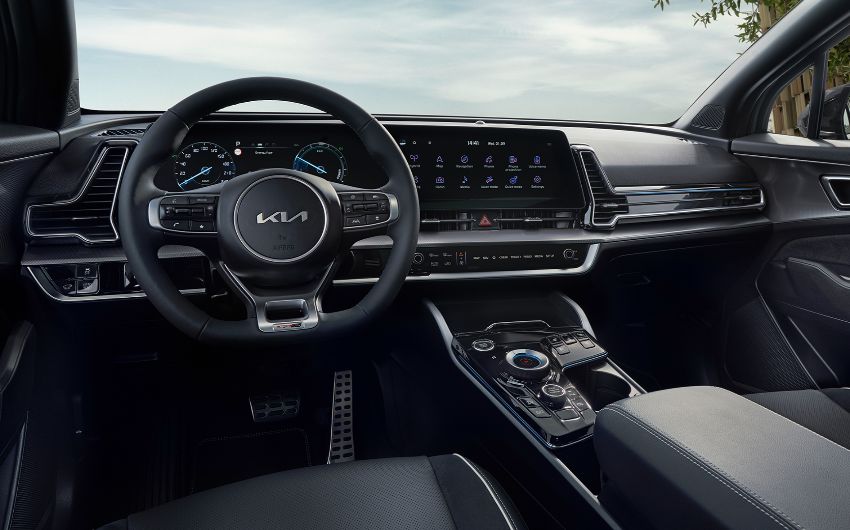 Kia Sportage 2021 interni abitacolo plancia curva